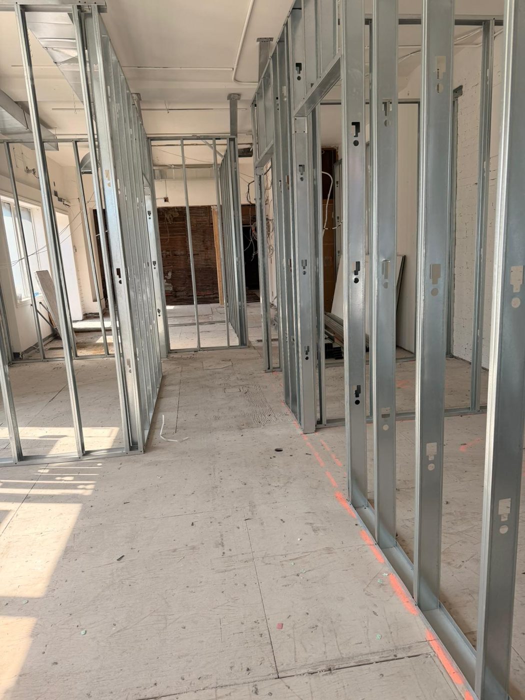 Framed hallway and rooms inside the new dental clinic